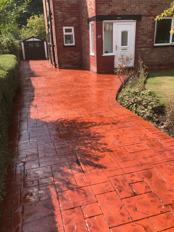 Terra-cotta with charcoal release printed driveway Timperley