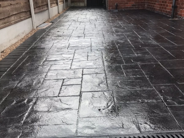 New classic grey concrete driveway in Stretford