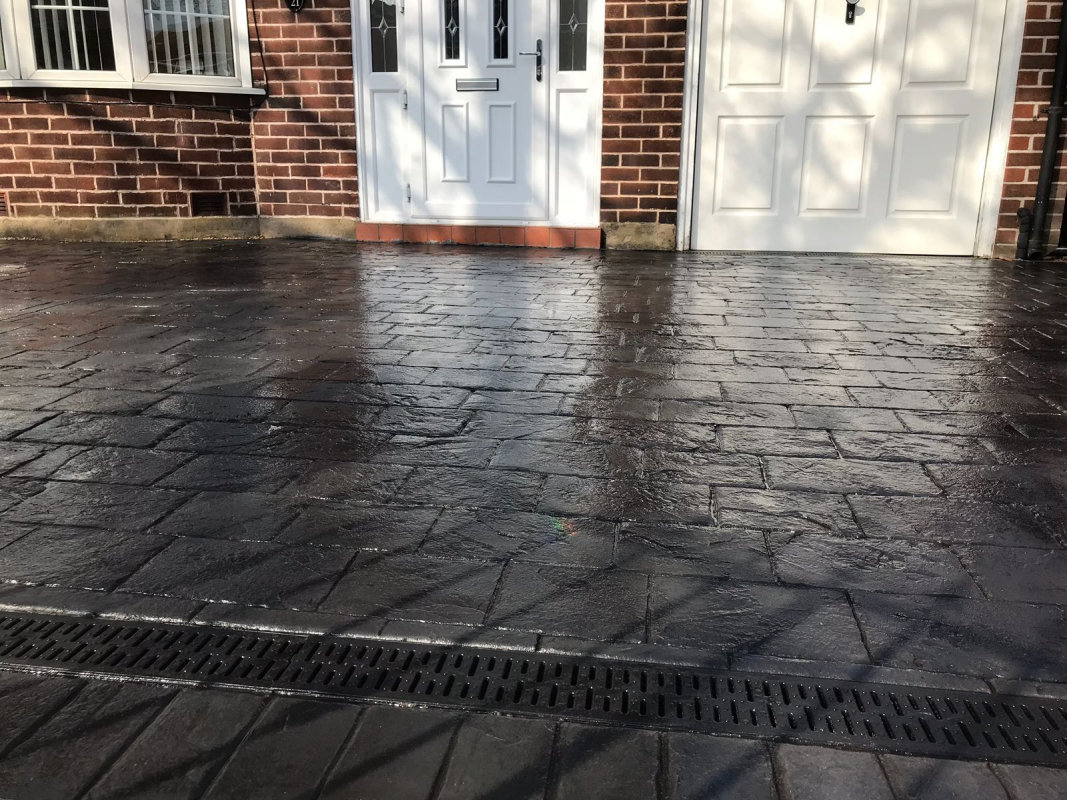 New pattern imprinted concrete driveway in Urmston