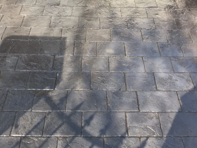 New pattern imprinted concrete driveway in Urmston