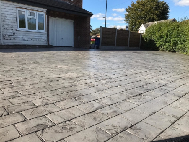 New pattern imprinted concrete driveway in Timperley