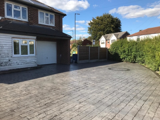 New pattern imprinted concrete driveway in Timperley