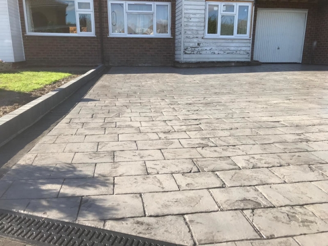 New pattern imprinted concrete driveway in Timperley