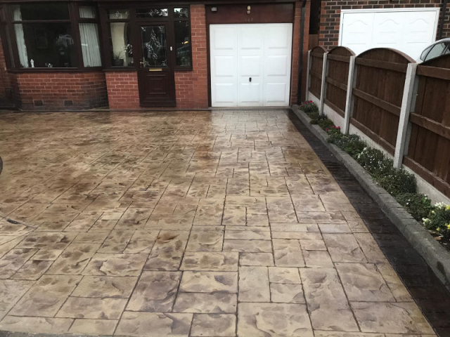 Beautiful new concrete driveway recently installed in Altrincham