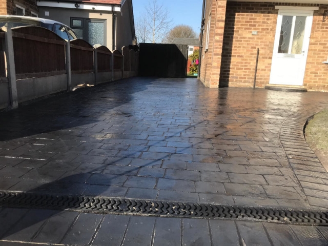 New pattern imprinted concrete driveway in Brooklands