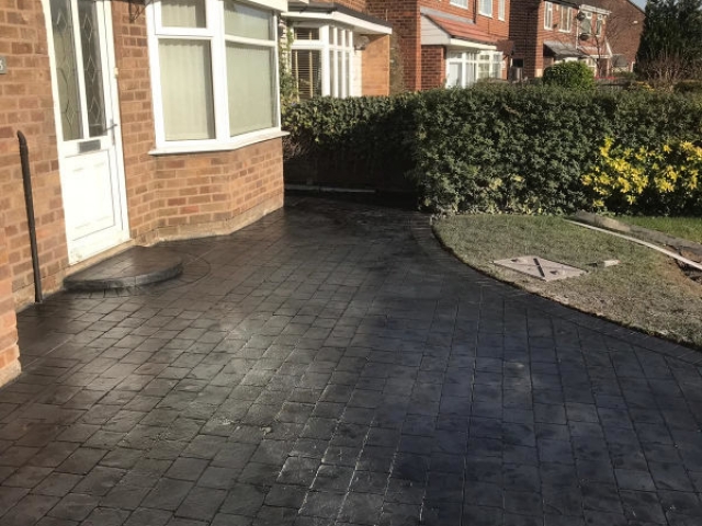 New pattern imprinted concrete driveway in Brooklands