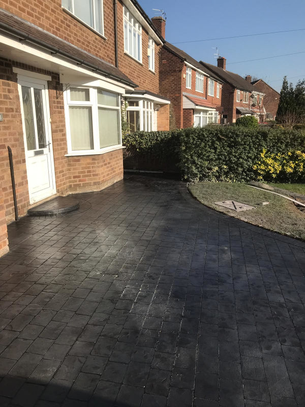 New pattern imprinted concrete driveway in Brooklands