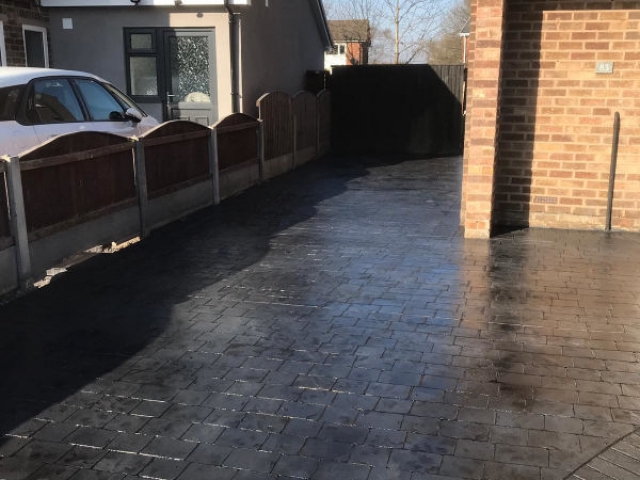 New pattern imprinted concrete driveway in Brooklands