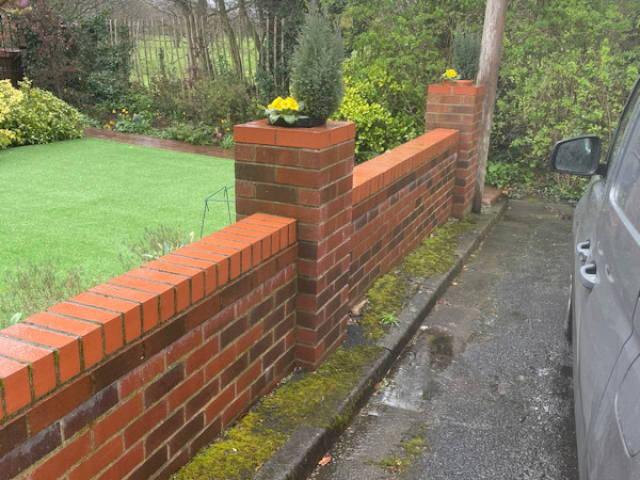 We also built a wall and lined the inside of the pillars to put plants in.